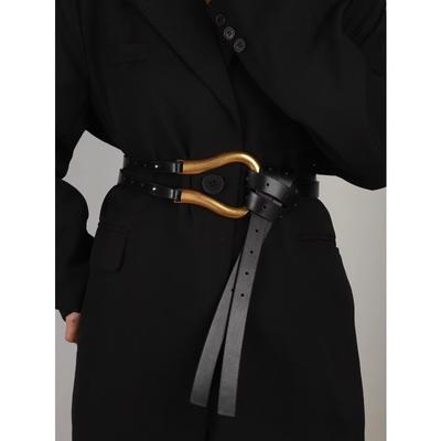 A Woman's Suit Belt with a Wide Waistband Large Horseshoe Button Decoration with Skirt Belt