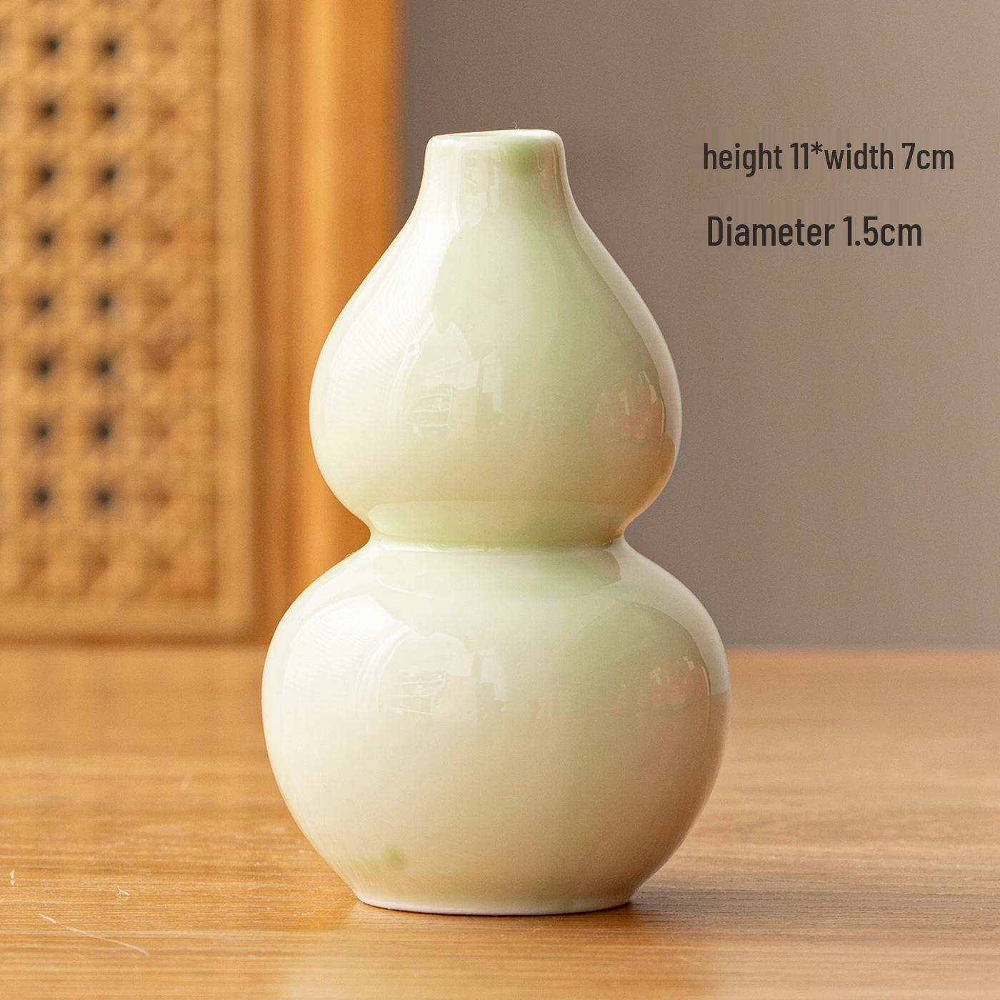 

Elegant Red Gourd Ceramic Vase for Living Room Flower Arrangement - High-End Retro Chinese Design See Details