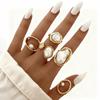 European-American Hot Selling Geometric Baroque Pearl Ring for Women - Retro Light Luxury Flower Design