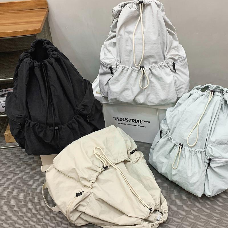 School bag new folding backpack multi-pocket bundle design simple solid color storage bag leisure travel couple backpack tide