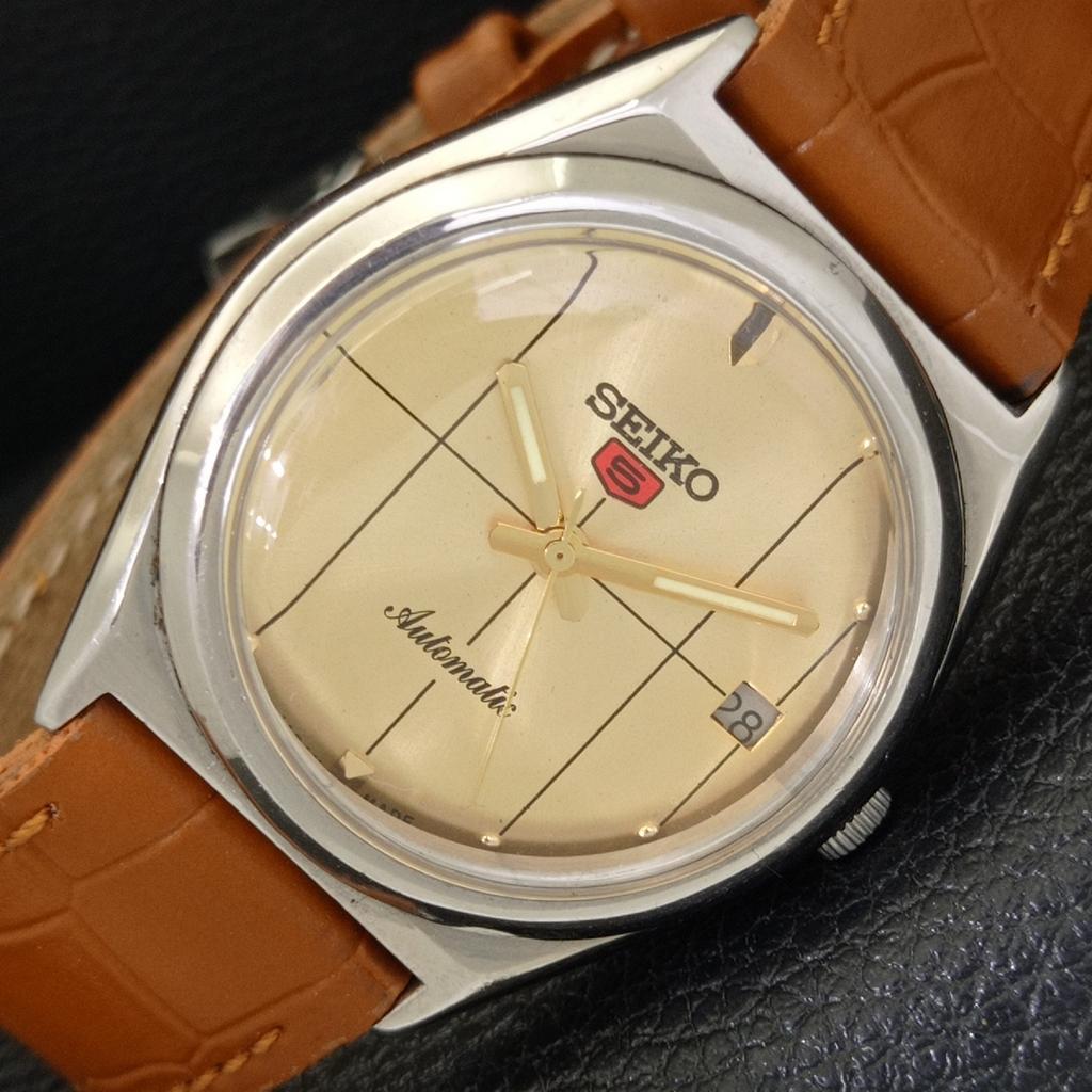 

ЯПОНИЯ ВИНТАЖ SEIKO 5 АВТОМАТИЧЕСКИЕ 7025A МУЖСКИЕ ЧАСЫ С ЦИФЕРБЛАТОМ ЗОЛОТИСТОГО ЦВЕТА a701603-5 R206c-a701603
