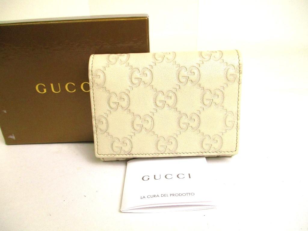 

Автентичний GUCCI GG Guccissima Pearl White Leather Card Holder #a230 Refurbished