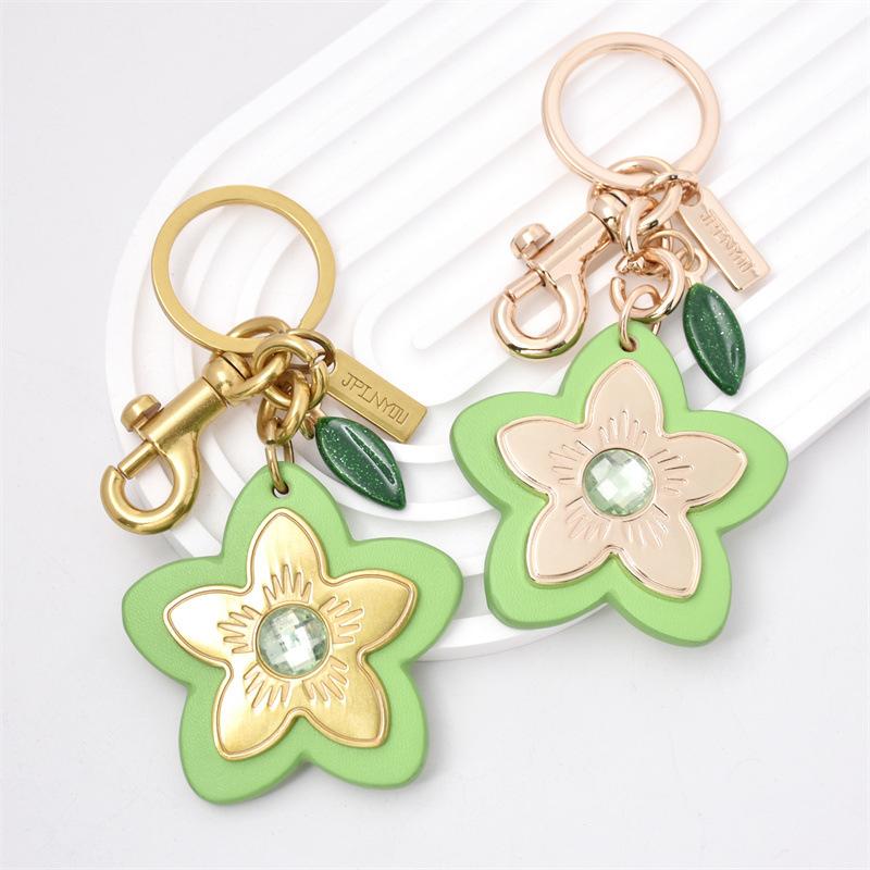 Marque de Luxe Sac Fleur Pendentif Mode Élégant Métal Cuir Créatif Exquis Polyvalent Mignon Accessoires Sac Porte-clés