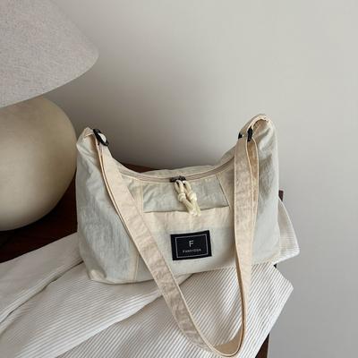 Wind Simple Shoulder Bag Women's New Casual Versatile Commuter Canvas Bag Dumpling Bag High Value Student