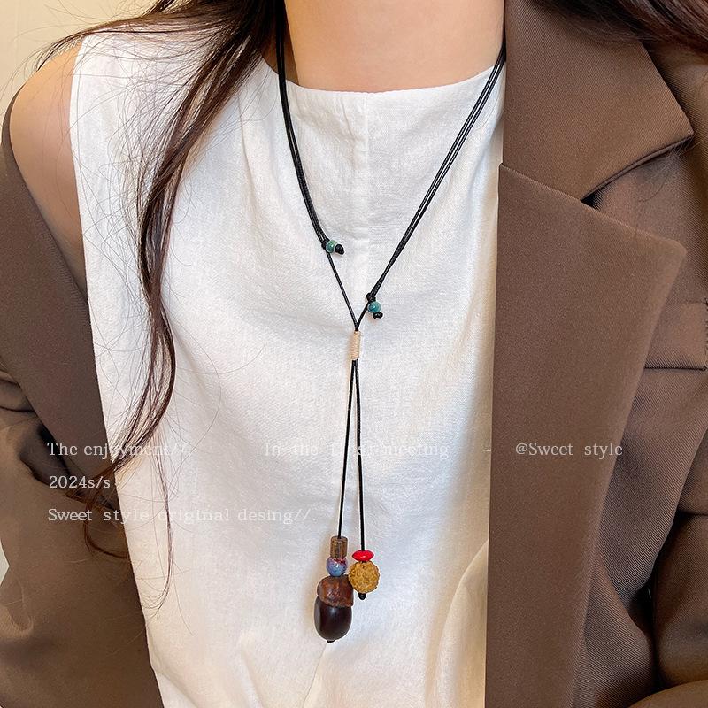 Autumn and winter retro pine nut woven necklace women's retro ethnic style fashion long sweater chain design sense