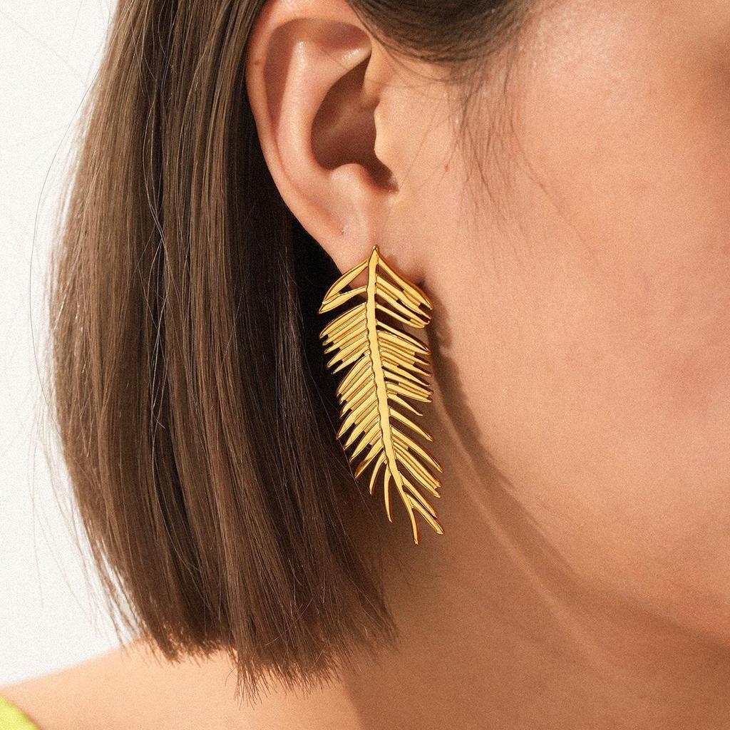 European & American Leaf Feather Stainless Steel Long Dangle Earrings - Stylish, Versatile, Light Luxury Jewelry for Women.