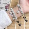 Exclusively designed lucky charm wrap-around bracelet with gourd bell, lucky cat bangle in thick silver-plated copper, perfect for live streaming.