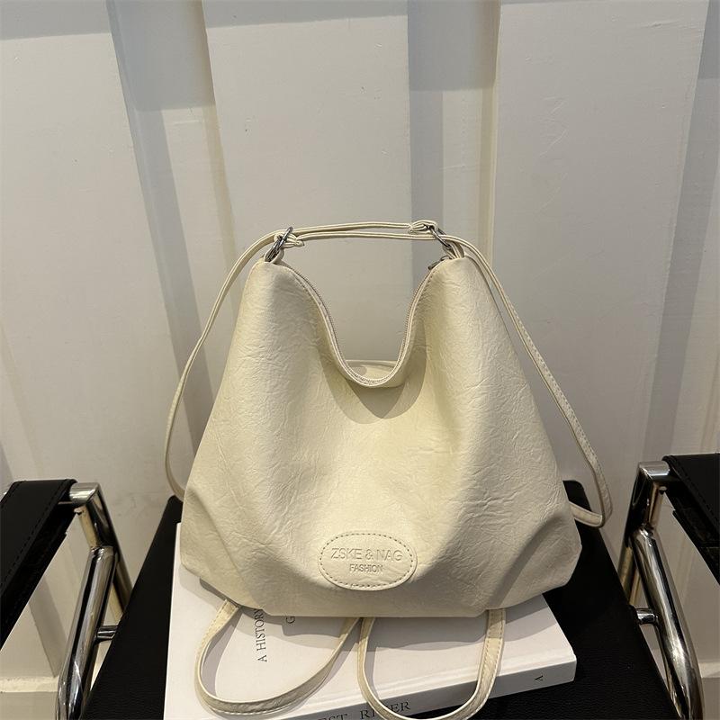 Large Capacity Vintage Style Faux Leather Bucket Bag Simple Solid Color Commuter Shoulder Crossbody Bag