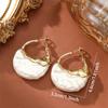 Retro and Simple Imitation Pearl Creative Earrings, Fashionable and Niche in Style, Geometric and High-end Ear Ornaments for Women.