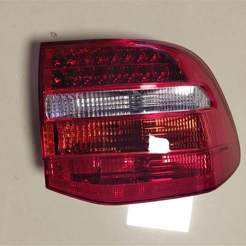 Compatible with 2007-2010 Porsche Cayenne: Rear Taillight, Brake, Reverse, and Anti-Collision Light Assembly.