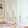 Elegant European Candle Holder Set: Electroplated Three-Piece Metal Ornament for High-End Dining and Wedding Décor.