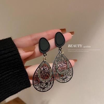 Silver Needle Hollow Water Drop Retro Earrings - Korean Style, Exaggerated Metal Niche Design for Women
