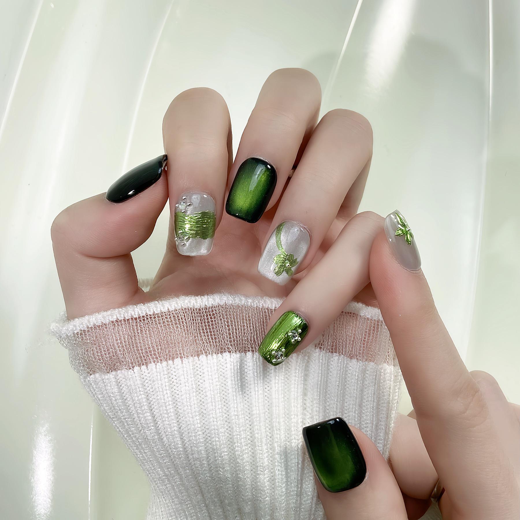 Hand-Painted Luxury Green Cat Eye Nails with Gold Foil & Floral Accents - Eye-Catching New Style