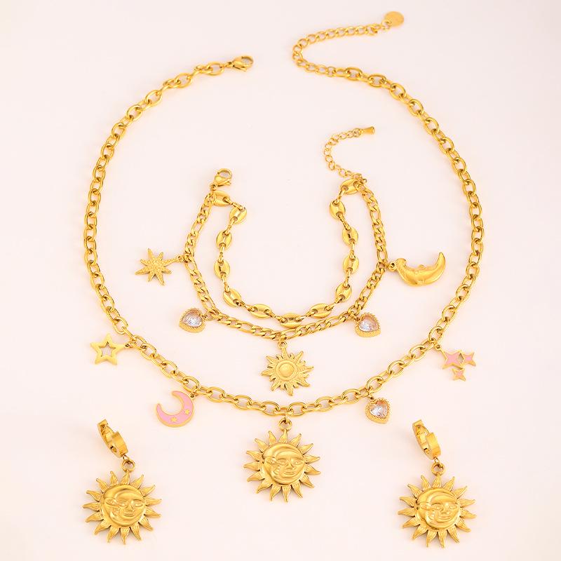High-End Sun Portrait Titanium Stainless Steel Jewelry Set: Necklace, Bracelet, and Earrings in Light Luxury Design for Women.