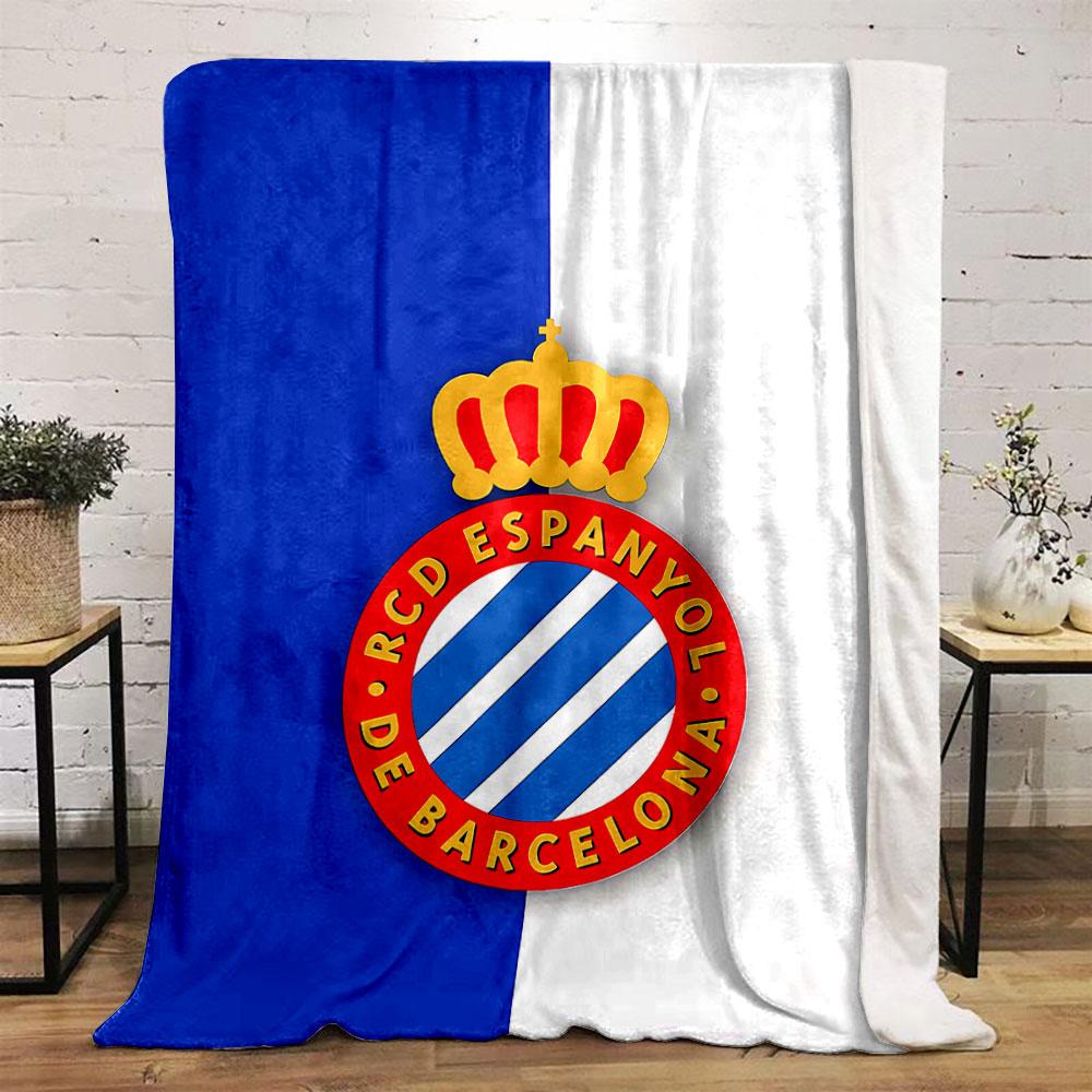 A blue and white striped crest with a red circular border and gold crown. for all seasons blanket lunch break throw gift