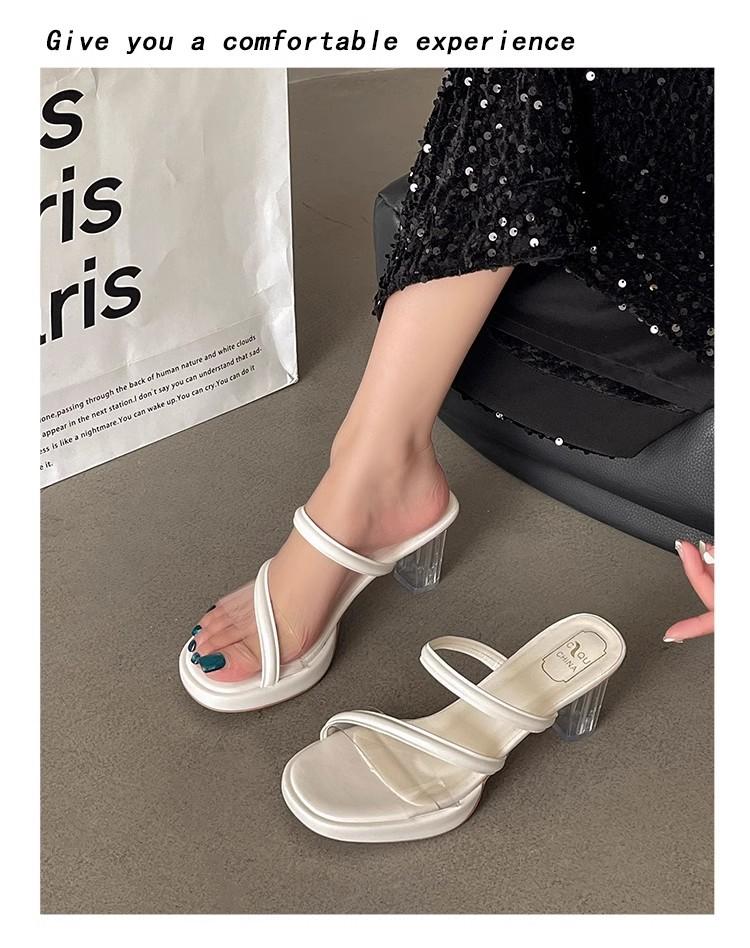 

2025 summer fashion new open-toed crystal cool slippers female transparent one-word belt outer wear with skirt high heels tide 42