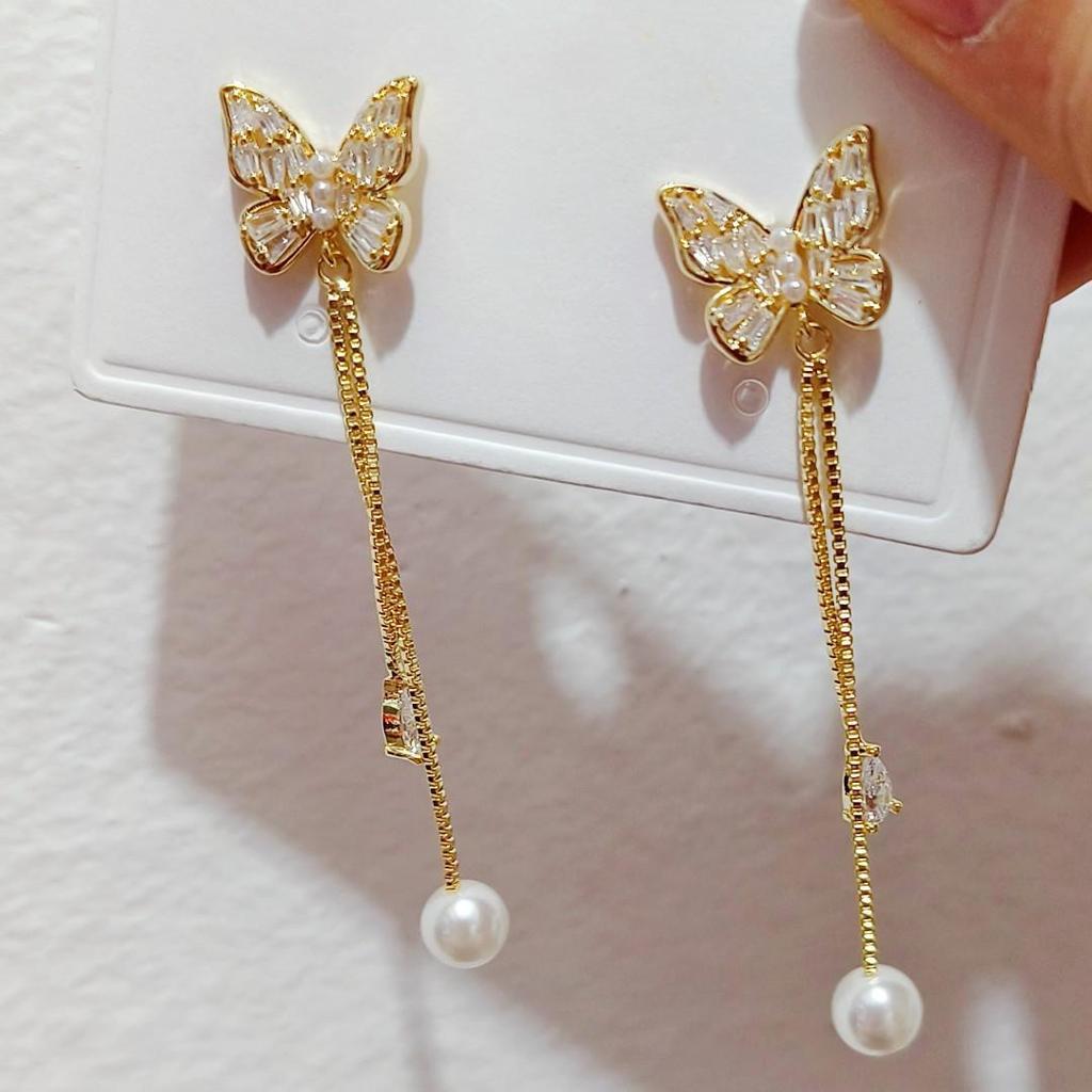 Eleganckie Europejskie i Amerykańskie Kolczyki z Długimi Chwostami - Modny, Luksusowy i Wszechstronny Design dla Kobiet