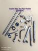 Octagonal Bearing Shuttle Accessory Kit: Wheel Shaft, Crochet Needle, Thread Hook, Needle Bar, Machine Bar, and Shoe Repair Press.