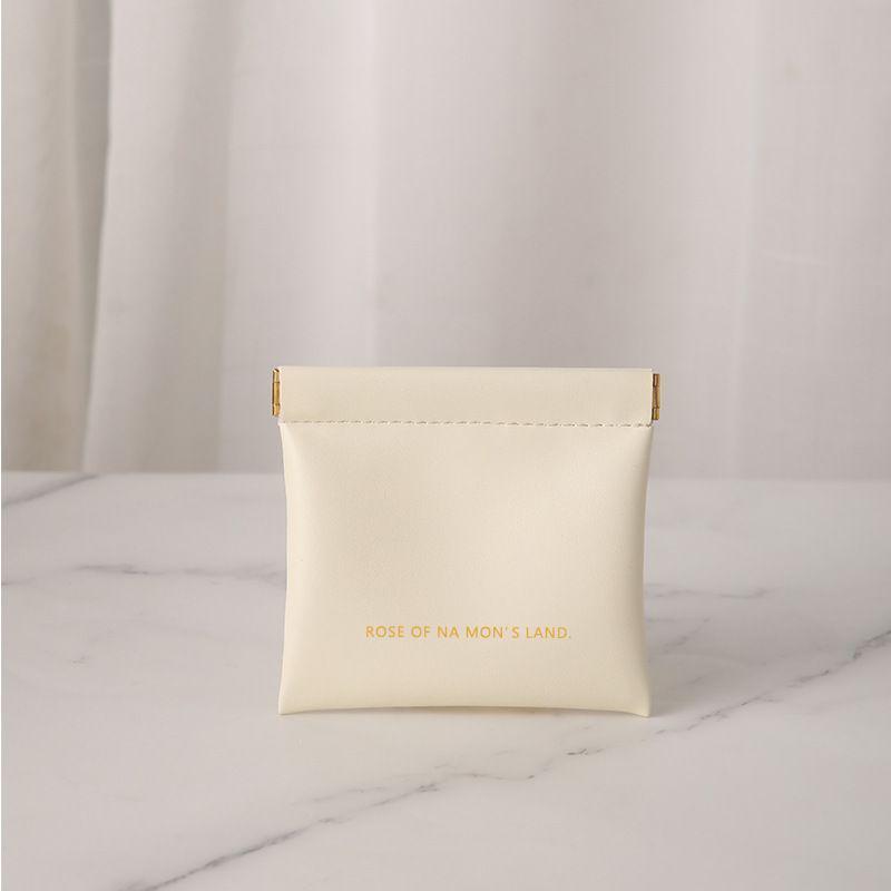 

Auto-Close Compact Storage Bag for Lipstick, Makeup, Coins, Charger, Earphones, and Cables Regular - Automatic Closing Storage Bag