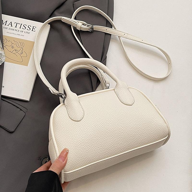 Korean Version of Simple and Gentle Wind Super Fire Solid Color Portable Bowling Bag Women's Versatile Fashion Temperament Commuter Messenger Bag
