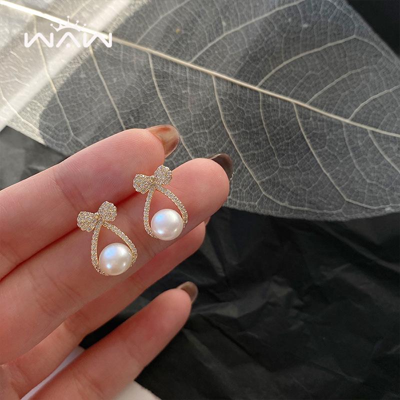 Sterling silver pearl earrings, new popular high-end light luxury temperament earrings, women s unique earrings