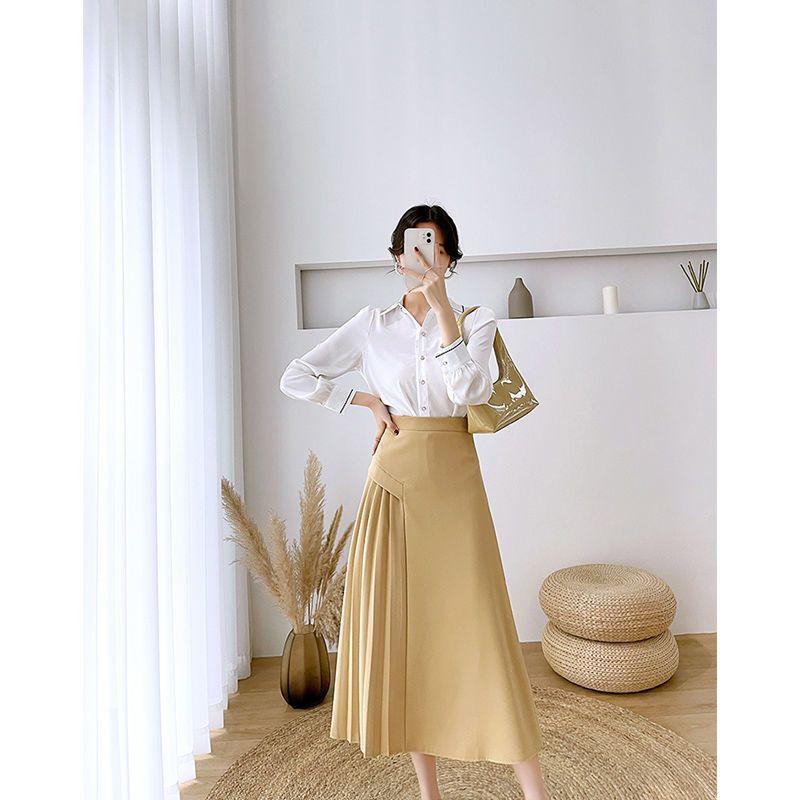Falda Sencilla Irregular Sólida Drapeada Plisada Femenina Primavera Temperamento Viajera Cintura Alta Línea A Largo Medio Falda de Traje