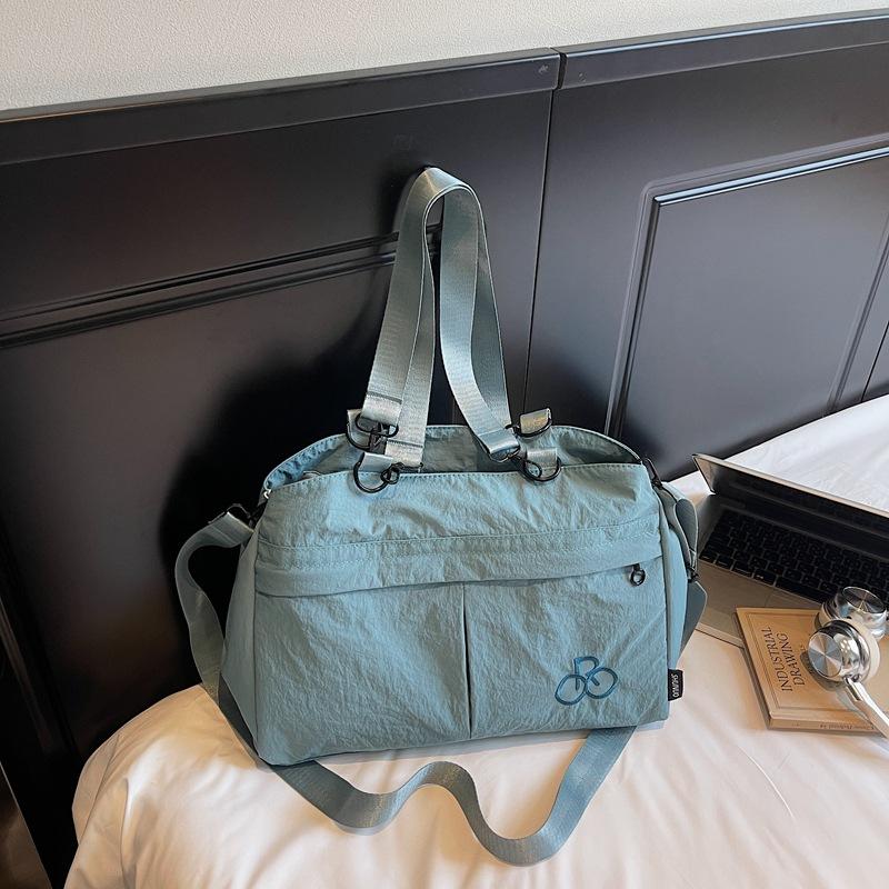 

Niche design casual simple personality fashion large-capacity bag autumn new 2025 women s shoulder crossbody bag синий