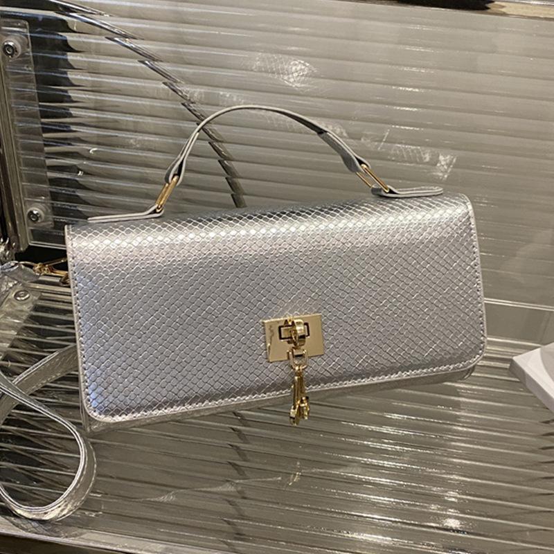 Bolsa de mão de cor sólida tendência 2025, design de nicho, versátil, grande capacidade, bolsa de ombro transversal, com fecho, bolsa feminina de temperamento