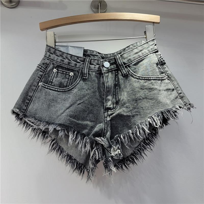 Korean version 2023 summer new fringed rough edge high waist denim shorts women's loose and thin a-shaped wide leg pants hot pants