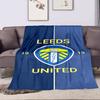 Leeds United Blue and Yellow Logo Blanket Patterned flannel blanket perfect for the bedroom living room, sofa, or a little nap