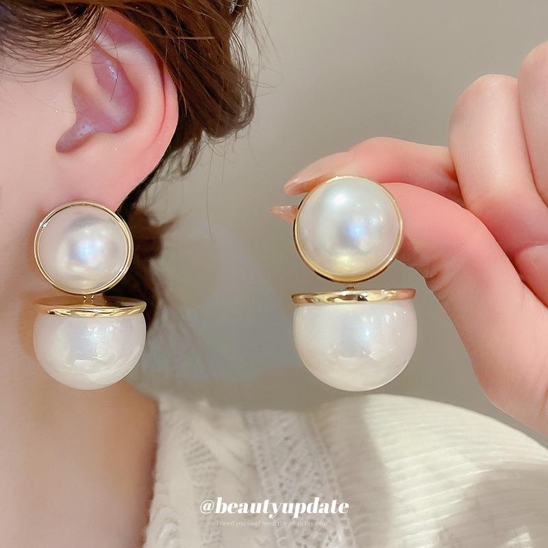Silver needle New Year's red round pearl stud earrings retro fashion earrings women's niche design earrings light luxury high sense