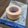 Jinshikang Medical Tape Roll: Strong, Skin-Adherent, Pressure-Sensitive Cotton Cloth Tape for Hand Protection and Tension Reduction.