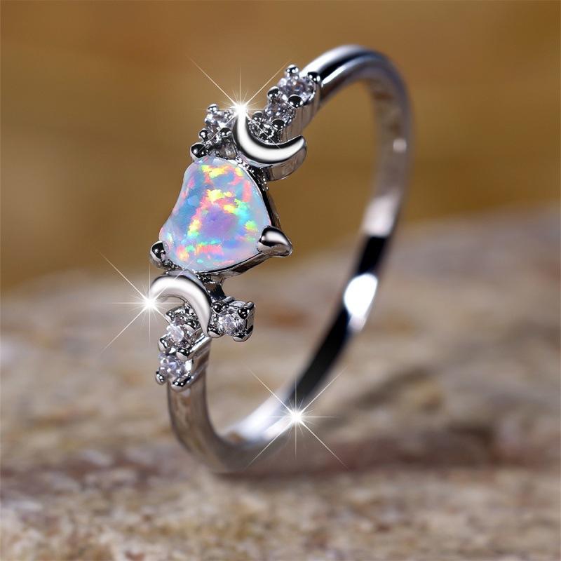 

Wish the new love white opal on both sides of the moon three claw ring simple personality ring no. 6