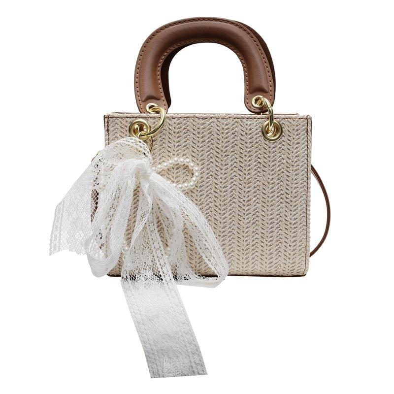 2025 new niche design fashion high sense straw woven portable Princess Diana bag foreign style versatile contrasting color messenger women's bag