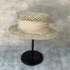 25 New Natural Salty Grass Woven Hollow Flat Top Straw Hat Women'S Summer Travel Visor French Elegant Top Hat Tide