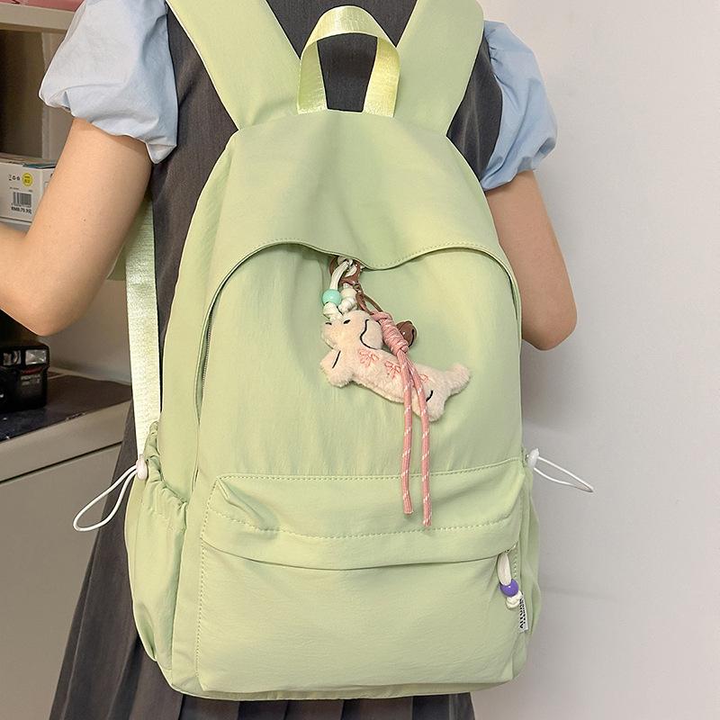 New small fresh schoolbag, high-capacity solid-color backpack for junior high school girls, high-value backpack for primary school students
