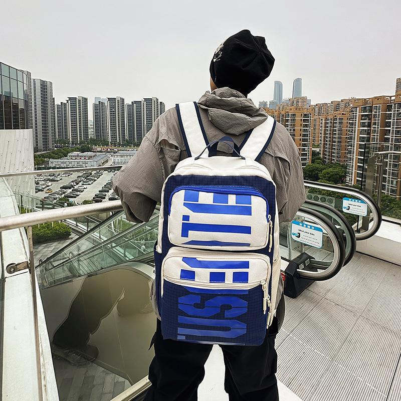 

Large capacity backpack travel backpack new student schoolbag high value casual backpack синій