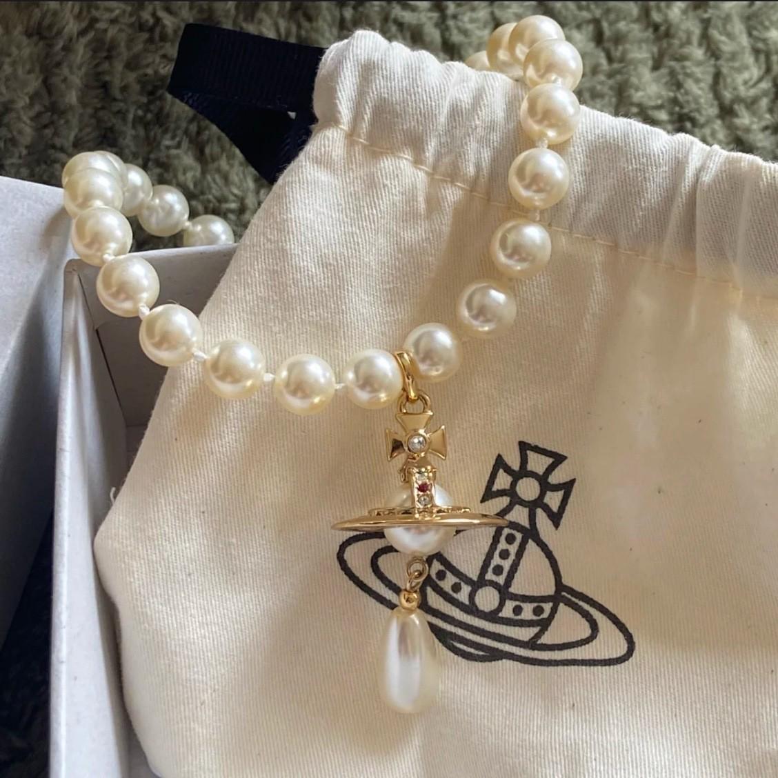 

Empress Dowager Teardrop Pearl Necklace with 3D Flying Saucer Pendant Natural