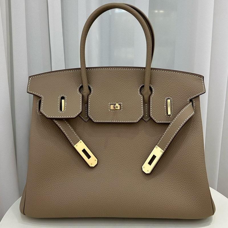 Nowy wzór Togo, skóra bydlęca pierwszej warstwy, wysokiej jakości przenośna torba listonoszka damska, duża pojemność