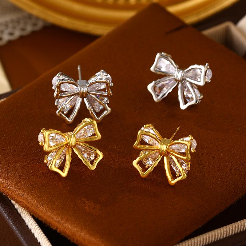 Elegant Gold-Plated Zirconia Bow Stud Earrings - High-End Fashionable Design for Women