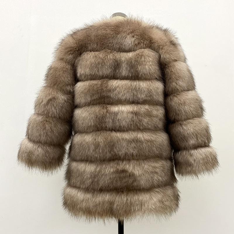Seven-section splicing jacket women's new autumn and winter clothing temperament fashionable artificial fur imitation fox hair thermal coat