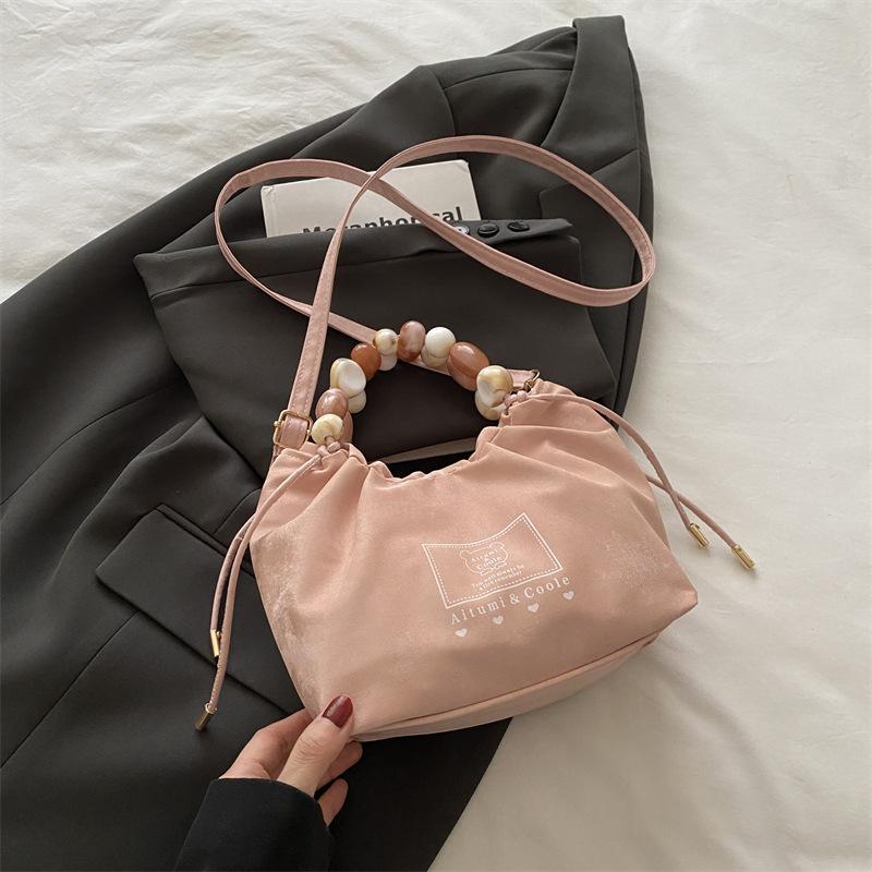 

Summer dumpling bag women s new trend versatile fashion beaded handbag casual texture messenger bag рожевий