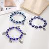 Blue Devil Eye Resin Bead Bracelet with Fatima Palm Pendant