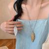 Elegant Rhinestone Pleated Leaf Necklace: Chic Versatile Clavicle Chain with a Luxe Niche Design for Women