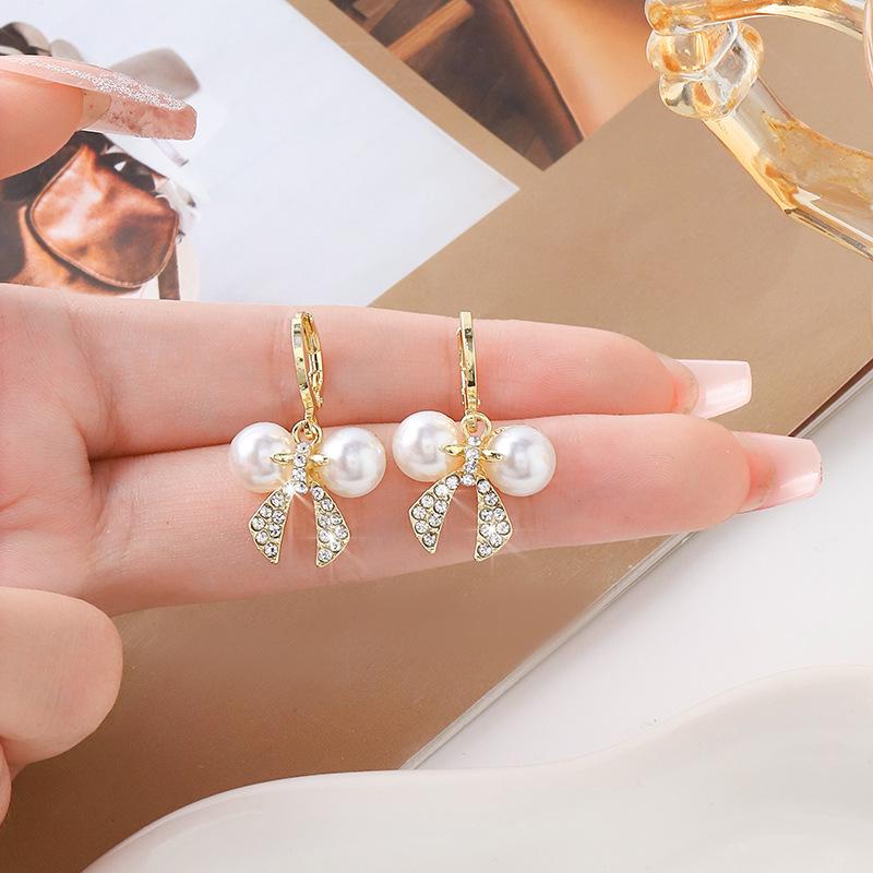 Elegante Quastenohrringe mit Perlen - Schickes & vielseitiges Design für Frauen