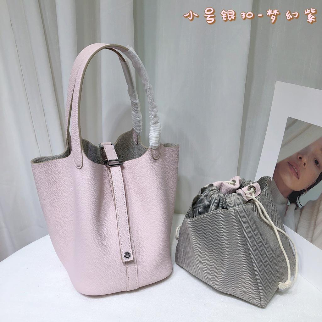 Spot wholesale top layer cowhide vegetable basket bag leather bucket bag commuter fashion lock buckle hand-held handbag woman