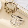 Meier Bracelet - vintage skull claw bangle - women's metal jewelry