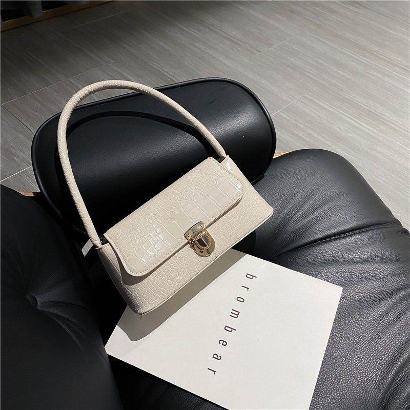 French Niche Bag, New Net Red Popular Shoulder Bag, Korean Version of The Hundred with Stone Pattern Fashion Armpit Bag