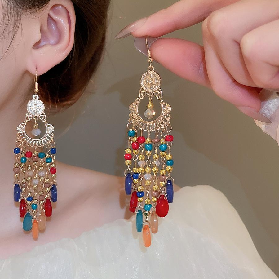 Bohemian ethnic style fringed earrings long niche woven feather earrings new travel wear earrings women
