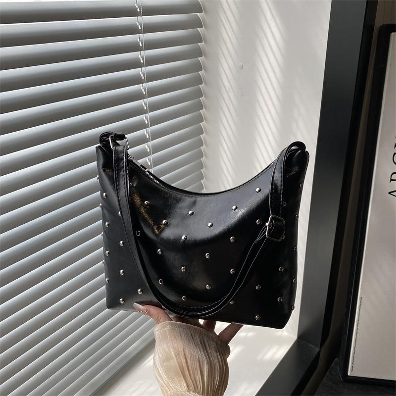 Stylish and simple rivet underarm bag women's new versatile dumpling bag high-end retro messenger bag